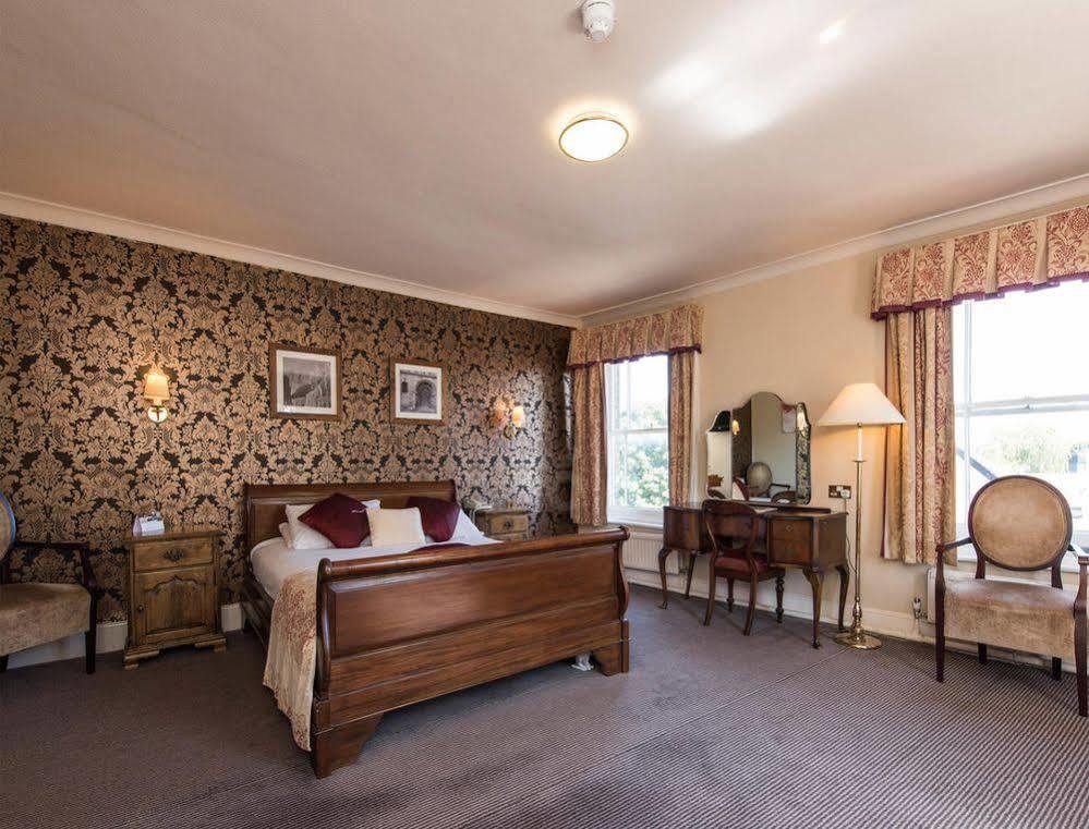 George Hotel By Greene King Inns ฮันติงตัน ภายนอก รูปภาพ